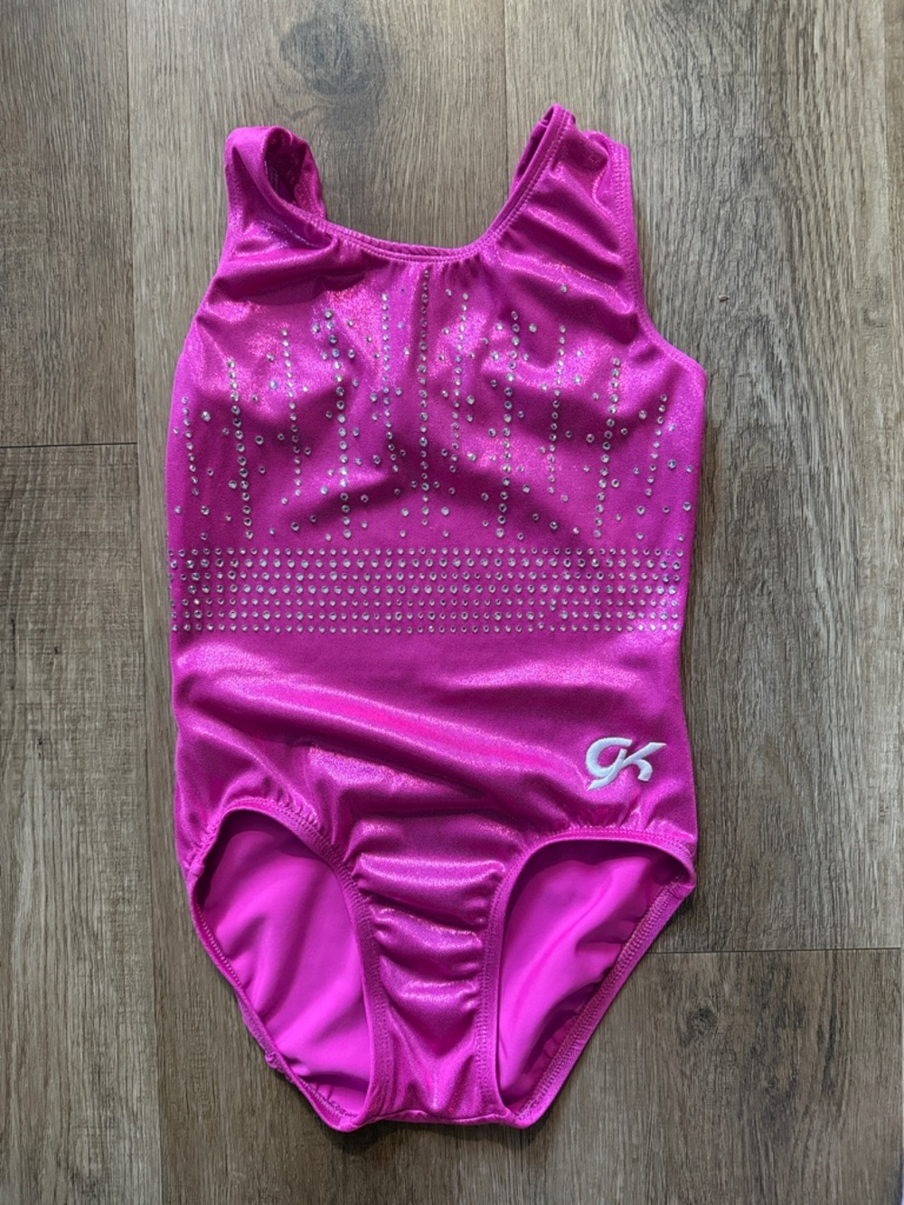 GK Elite gymnastics tank leotard featuring sparkling rhinestone details Size L